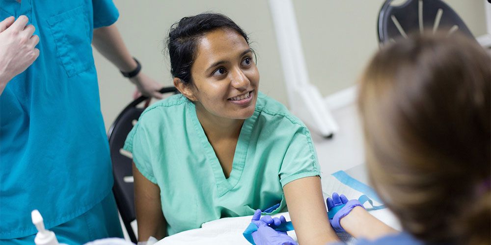 SGU Graduate with Patient