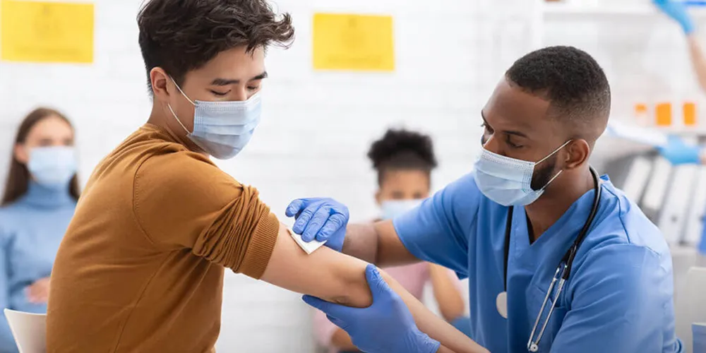 Dr. administering vaccine