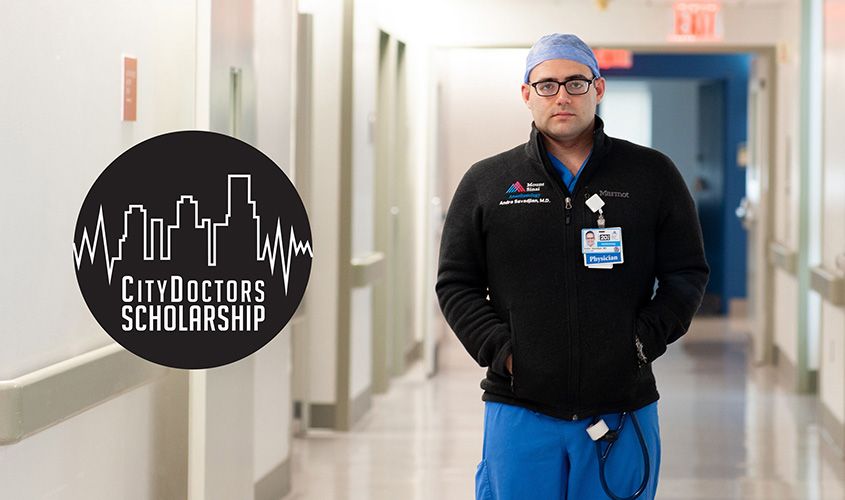 Physician in scrubs wearing an ID badge with the **CityDoctors Scholarship logo** in a hospital setting