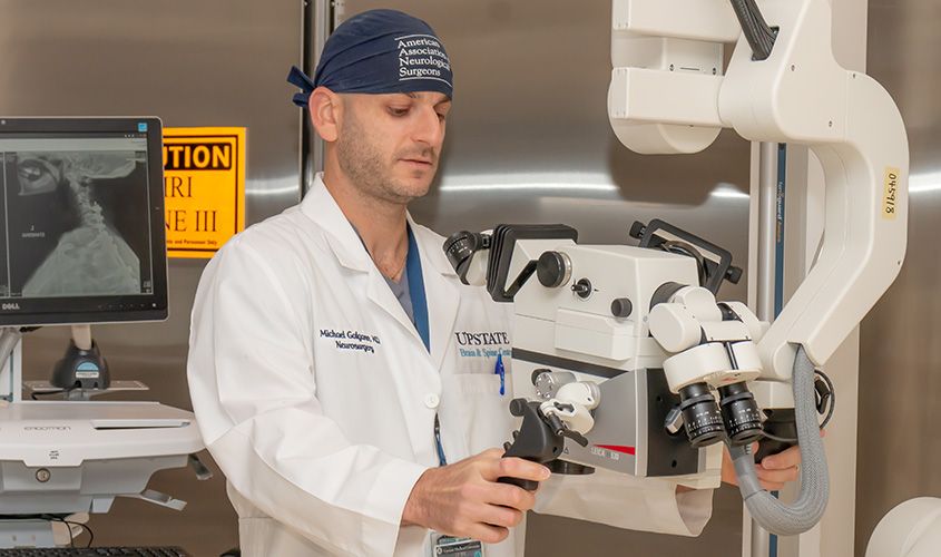 Dr. Michael Galgano, assistant professor and neurosurgeon specializing in complex spinal oncology and deformity surgery