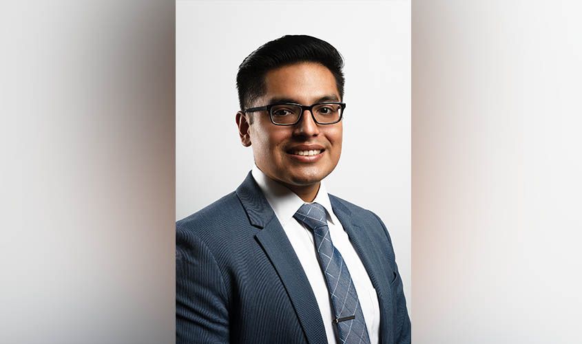 St. George University 4th Year medical student Joshue Leyva smiles in a formal photo.