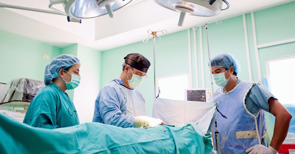 SGU surgical team performing an operation in a modern operating room in Grenada.