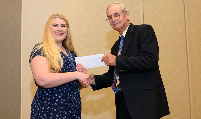 SGU student, Camille Ogdon, receiving an academic award during a recognition ceremony.