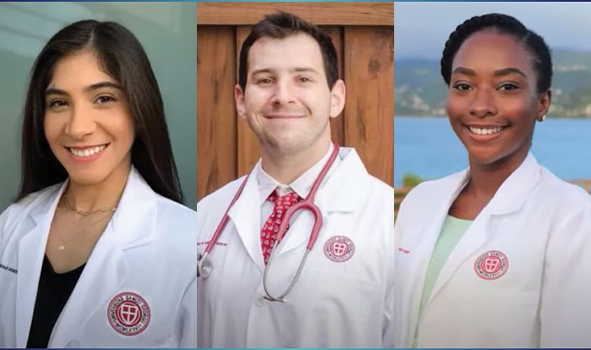 A group of three St. George's University students posing together on the campus in Grenada.