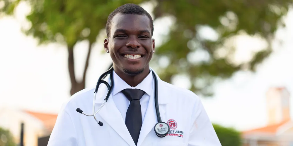 Term 1 SVM student Simunye Alexander at the Spring 2026 SVM White Coat Ceremony