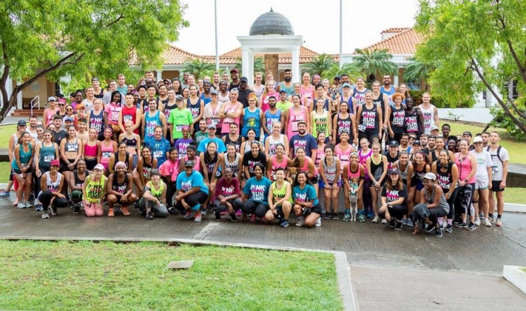 Participants in St. George's University's Women in Medicine (WIM) 5K Pink Run/Walk, raising breast cancer awareness in Grenada. News