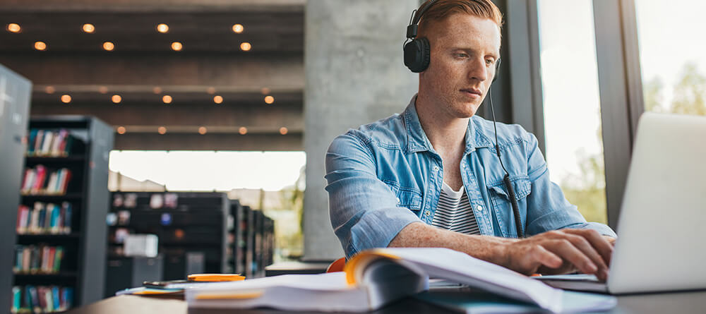 Pre-med student studying in library