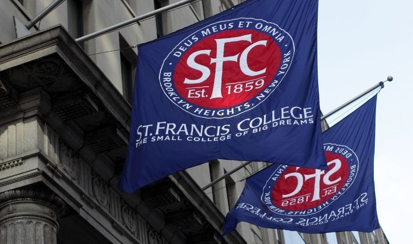 The St. Francis College flag hanging and waving